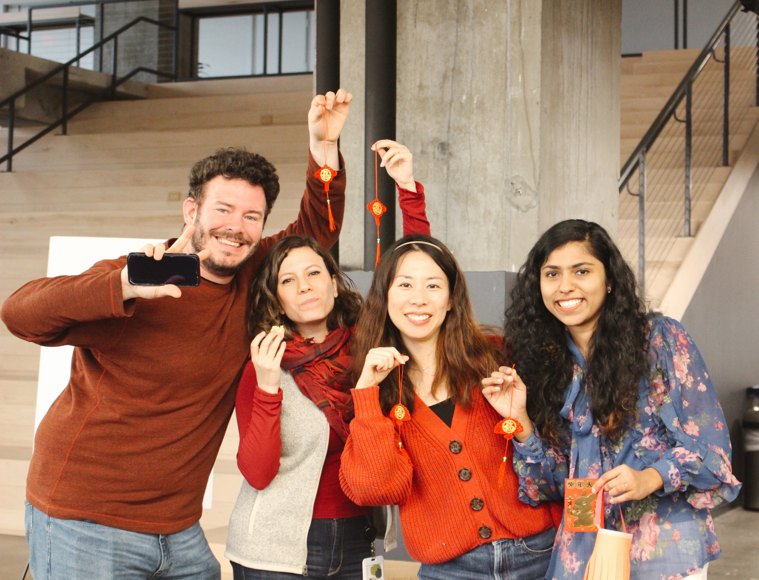 OneTrust employees take a group photo at an Asian@OneTrust employee trust group event celebrating the lunar new year